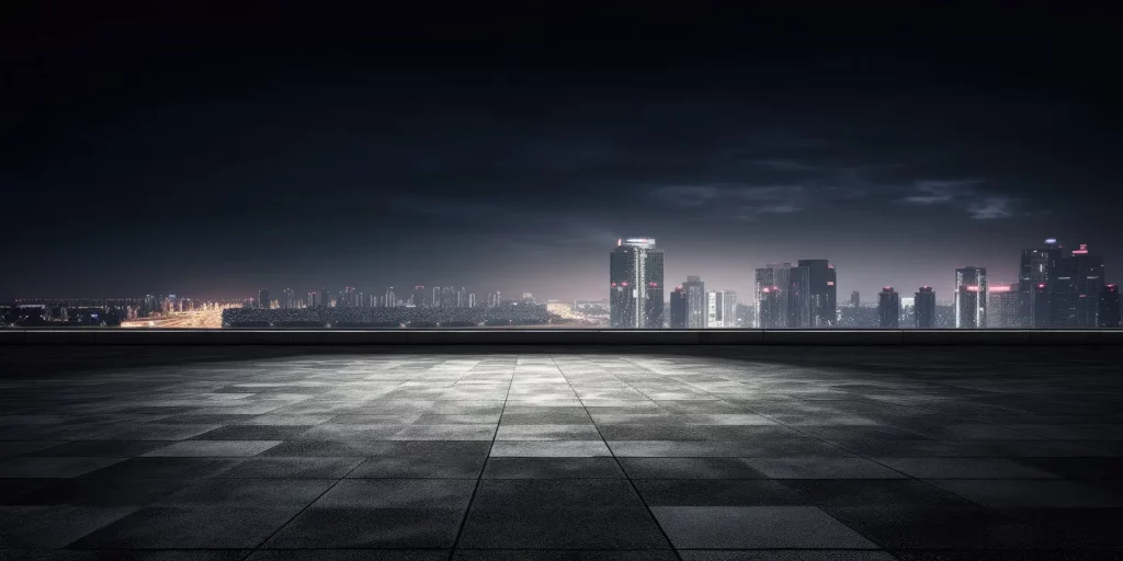 Dark concrete floor foreground, night city skyline background